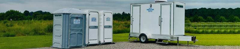 Where should handicap porta potties be placed for maximum accessibility?